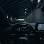driving through city tunnel at night with gps