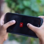 youtube logo on smartphone